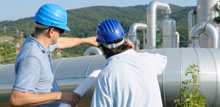 Photo of two engineers in a Geothermal power station